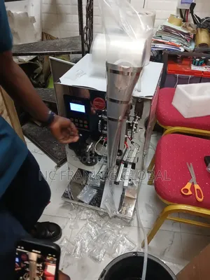 Liquid Filling and Packaging Machine