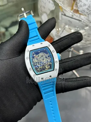 "Quartz Rm Watch - Budget-Friendly Rubber Strap"