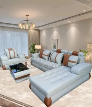 Fine Leather L-Shaped Couch and Single Chair With Table