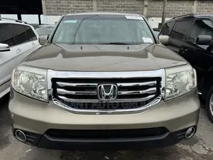 Honda Pilot Touring w/RES/Navi 4WD (3.5L 6cyl 5A) 2011 Gold