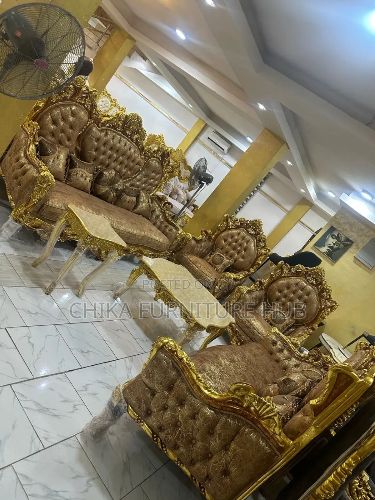 A Set of Royal Sofas Wit a Centre Table Nd Stools