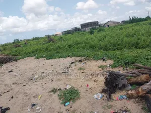 One Acre of Land Asese With Shops Facing Lagos Ibadan Way