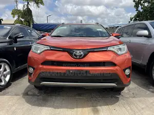 Toyota RAV4 Limited 4dr SUV AWD (2.5L 4cyl 6A) 2018 Orange