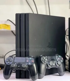 London Used Ps 4 Pro 1tb With 2 Pads and 12 Games