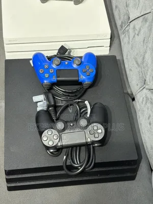 Uk Used Ps4 Slim With 12games and 2pads