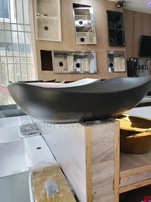 Black Canoe-Shaped Counter Top Basin