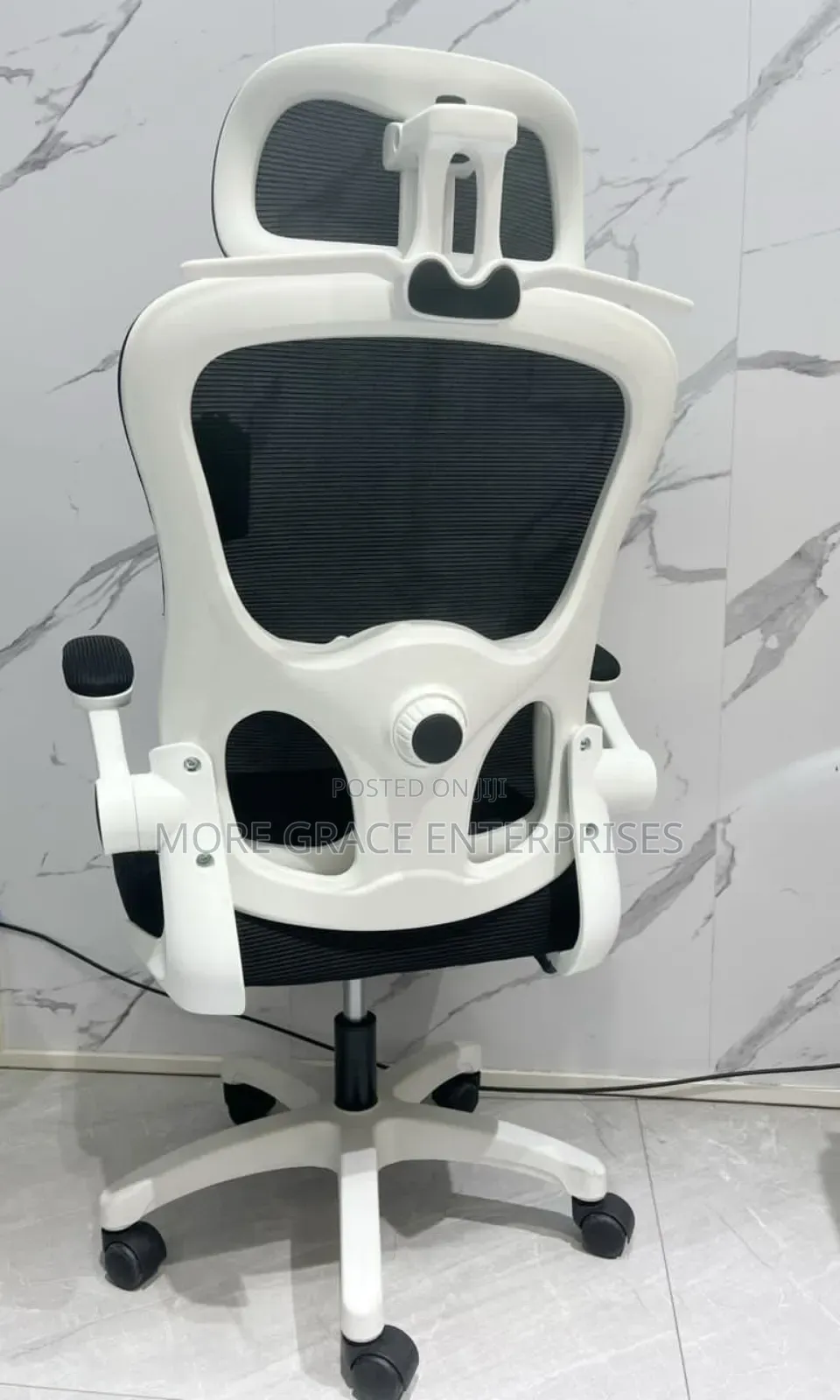 Special Office Chair Swivel With White Back and Headrest.