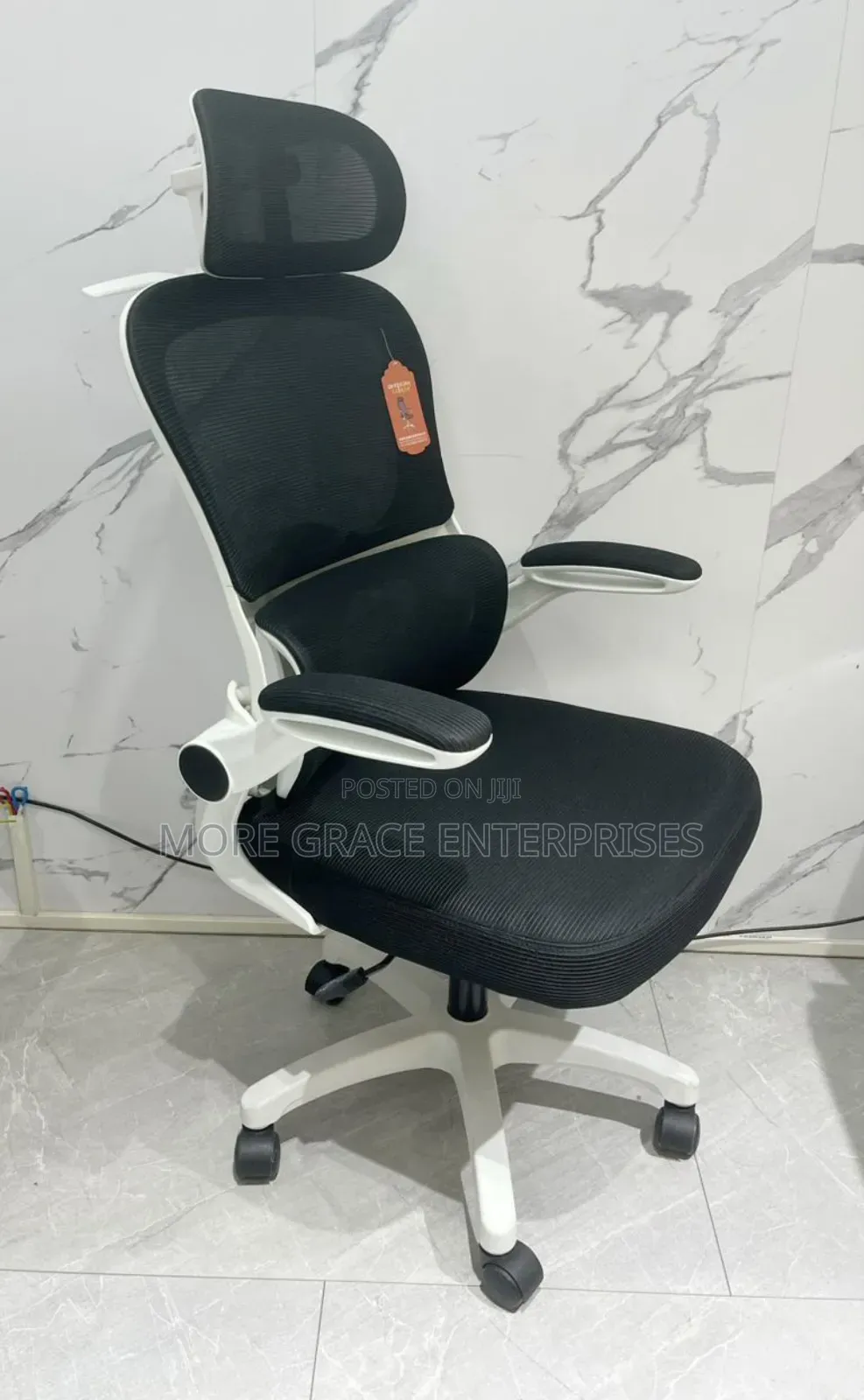 Special Office Chair Swivel With White Back and Headrest.
