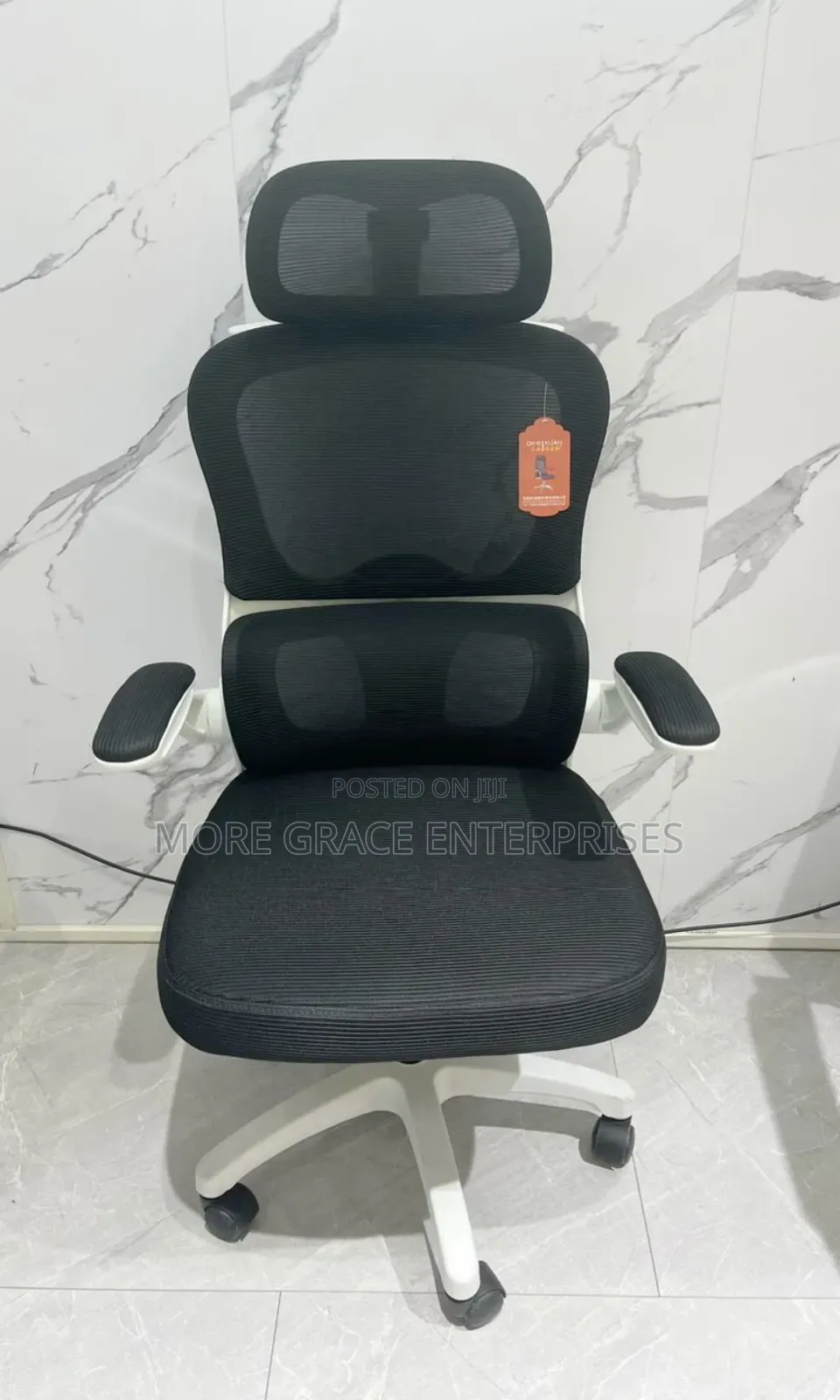 Special Office Chair Swivel With White Back and Headrest.