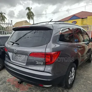 Honda Pilot Touring 4dr SUV 4WD (3.5L 6cyl 9A) 2016 Gray