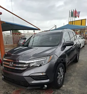 Honda Pilot Touring 4dr SUV 4WD (3.5L 6cyl 9A) 2016 Gray