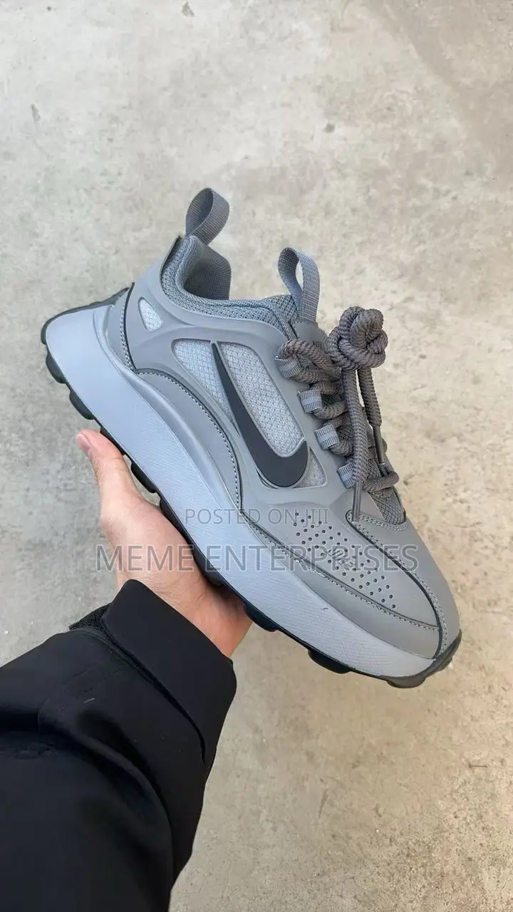 Nike (Ash) Sneakers.
