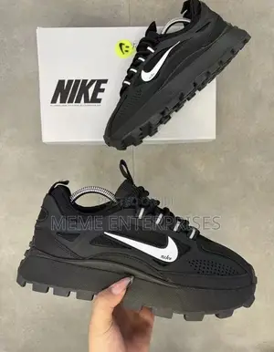 Nike (Ash) Sneakers.