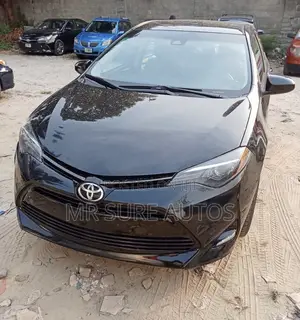 Photo - Toyota Corolla LE (1.8L 4cyl 2A) 2019 Black