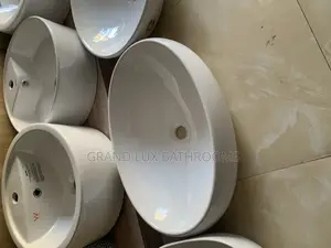 Oval White Ceramic Vessel Sinks on Display