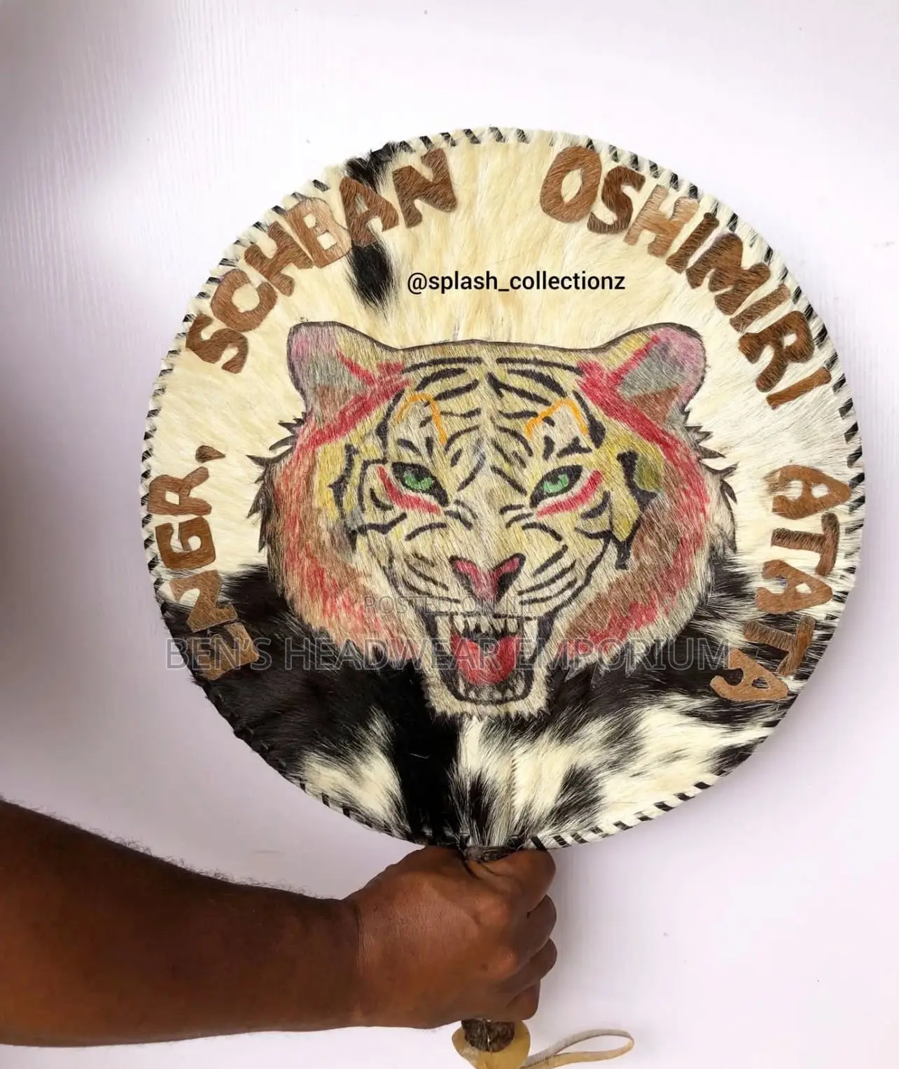Isi Agu  Customised Handfan.