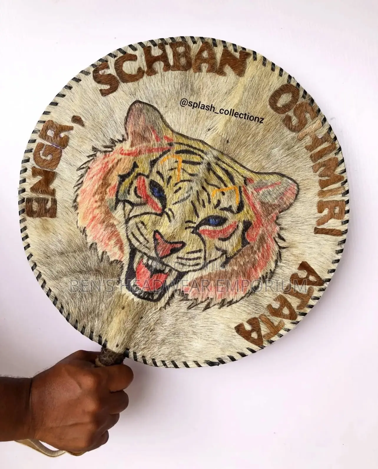 Isi Agu  Customised Handfan.