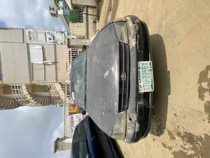 Photo - Toyota Carina E 1998 Gray
