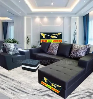Living Room Couches. L-Shape Sofa and Single Chair and Table
