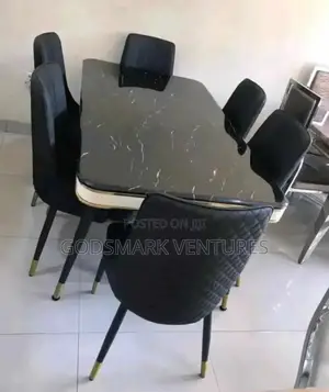 6 Seater Black Dining Set With Marble Top.