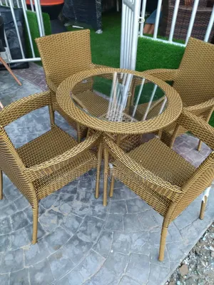 Set of Rattan Chairs by Four
