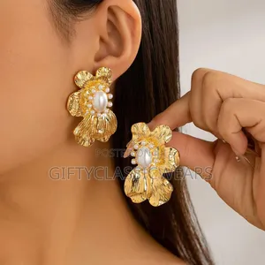 Photo - Delicately Crafted Gold Flower Earrings