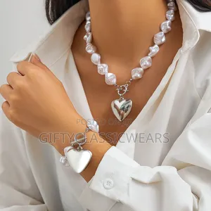 Photo - Beautiful Drop Neck Costume and Bracelet.