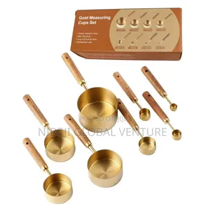 A Set of Eight Stainless Steel Measuring Cup