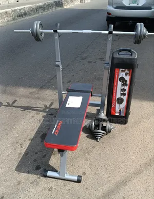Photo - 50kg Cast Iron Barbell and Dumbbell Set With Bench Press