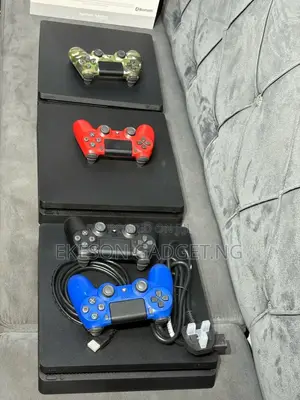 Ps4 Slim With 2pads and 12games Installed
