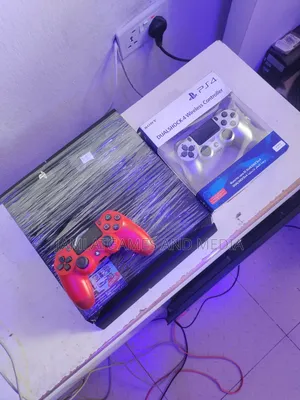 Playstation 4 With 15-20games, 2pads
