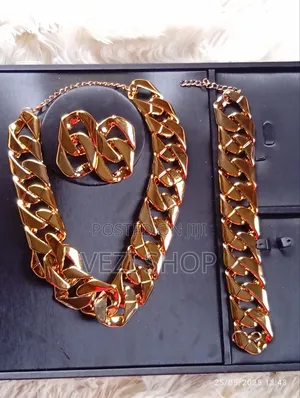 A 3 - Set Classic Bold Golden Jewelry