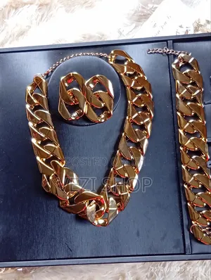 A 3 - Set Classic Bold Golden Jewelry