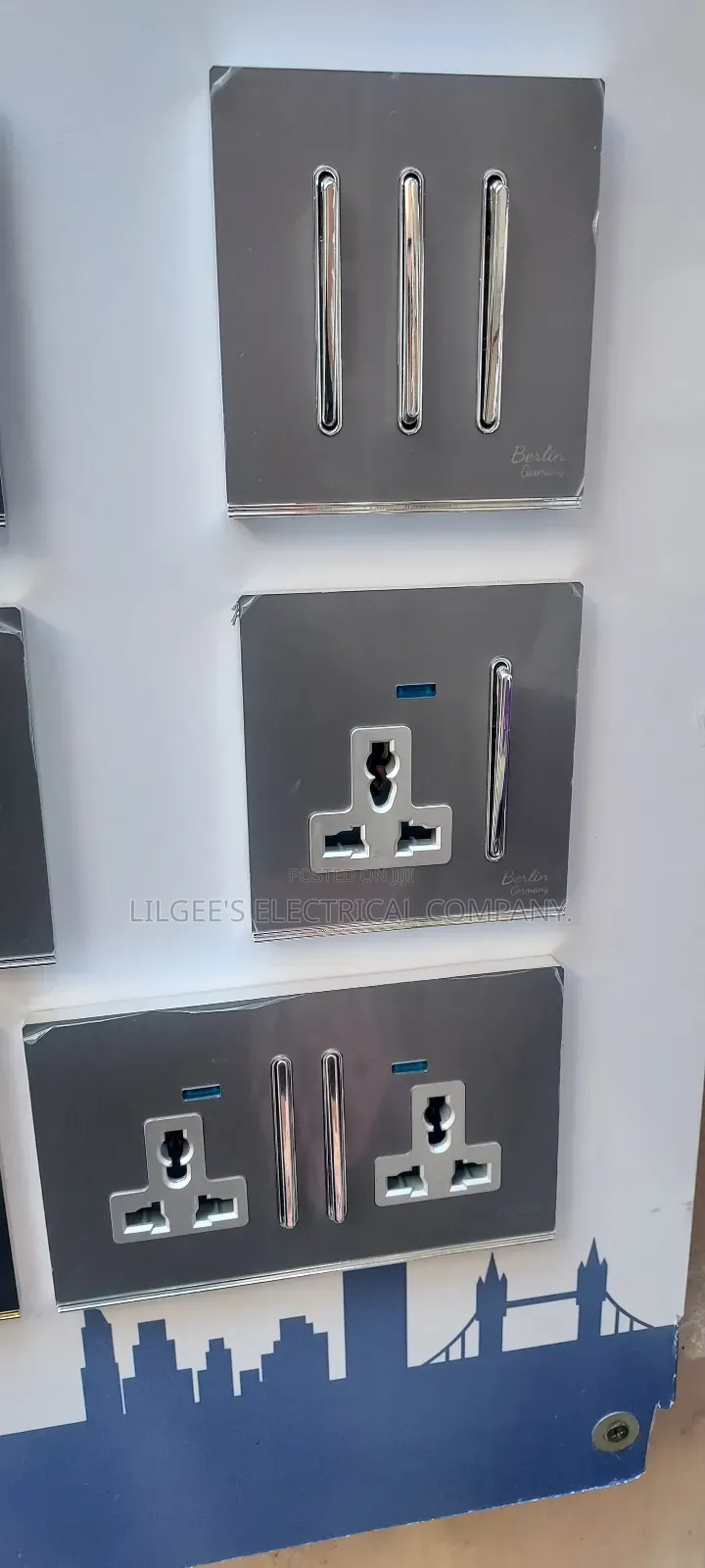 Berlin Germany Sleek Tiny Button Grey Colour Switch Sockets
