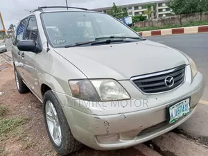 Photo - Mazda E2000 2001 Brown