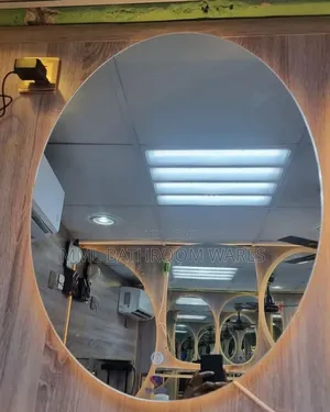 Photo - Oval Backlit Led Mirrors With 3 Color Lights