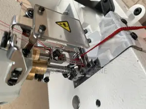 Two Tigerly Taping Machine