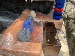 Beautiful Sofa Gold With Troll Pillows and Table Is Availabl