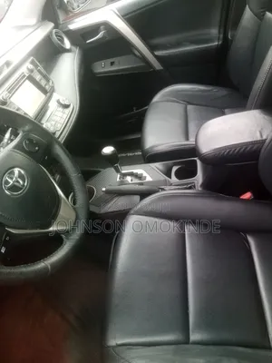 Toyota RAV4 Limited 4dr SUV (2.5L 4cyl 6A) 2014 Orange