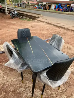 Foreign Dinning Table With 4 Sitter Luxurious Chair