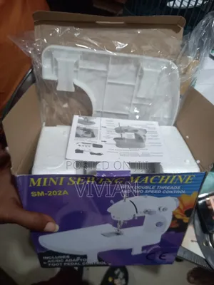 Mink Sewing Machine With Table