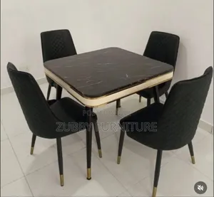 Quality and Imported Marble Top Dining Table by 4 Chairs
