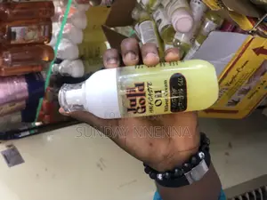 Photo - Juli Gold Half Caste Oil