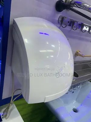 Wall-mounted Automatic Hand Dryer In Modern Bathroom