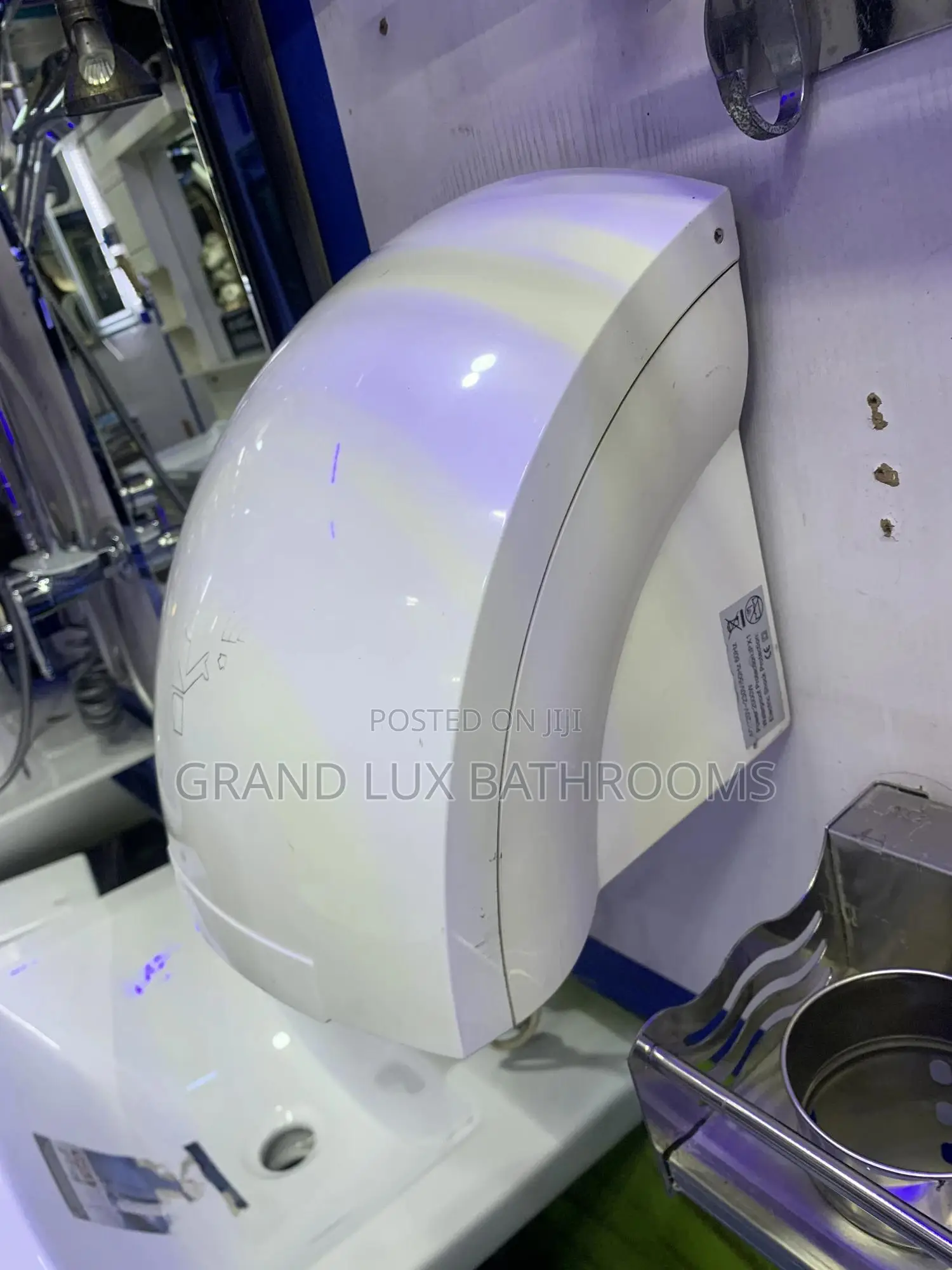 Wall-mounted Automatic Hand Dryer In Modern Bathroom
