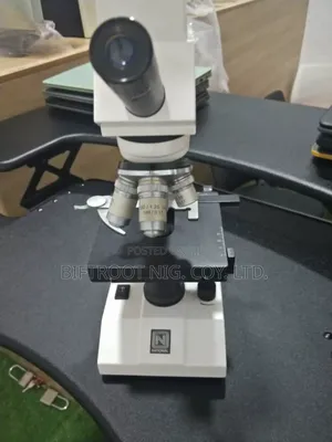 Dc-128 Compound Microscope