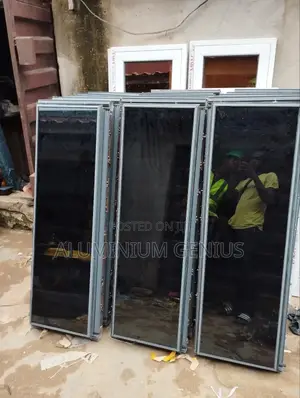 White Frameless Window With Grey Reflective Glass
