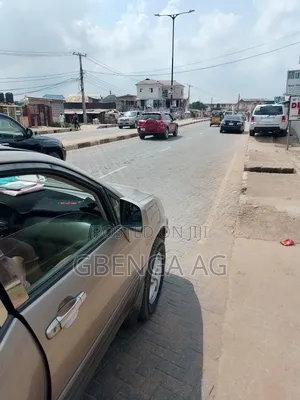 Photo - 1 and Half Plot of Commercial Land for Sale at Ipaja Lagos