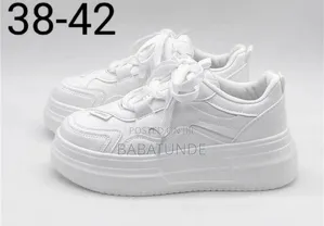 Photo - Pure White Sneakers