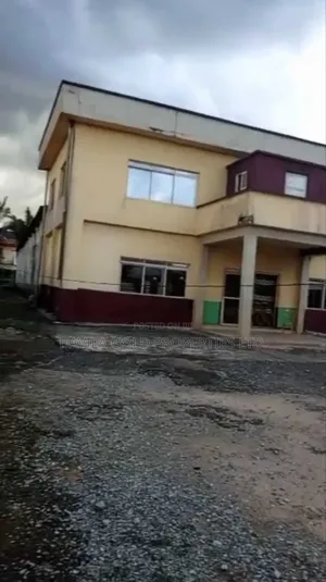 A Land With a Building for Sale